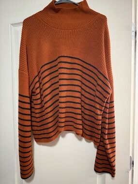Cozy Rust Striped Turtleneck Sweater